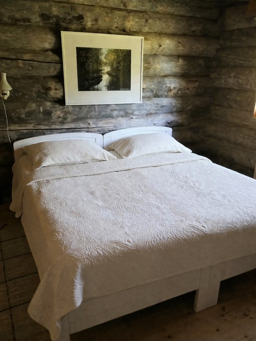 Bedroom with log walls